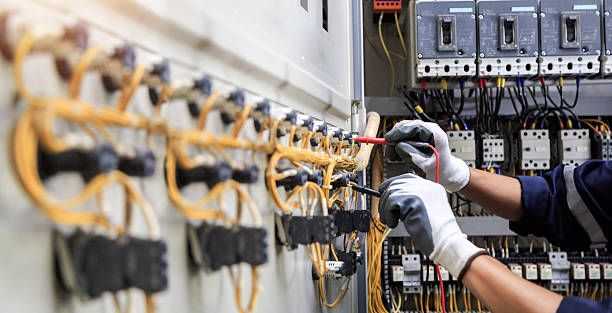 Professional Emergency Electrician technician working in Midland County County, MI